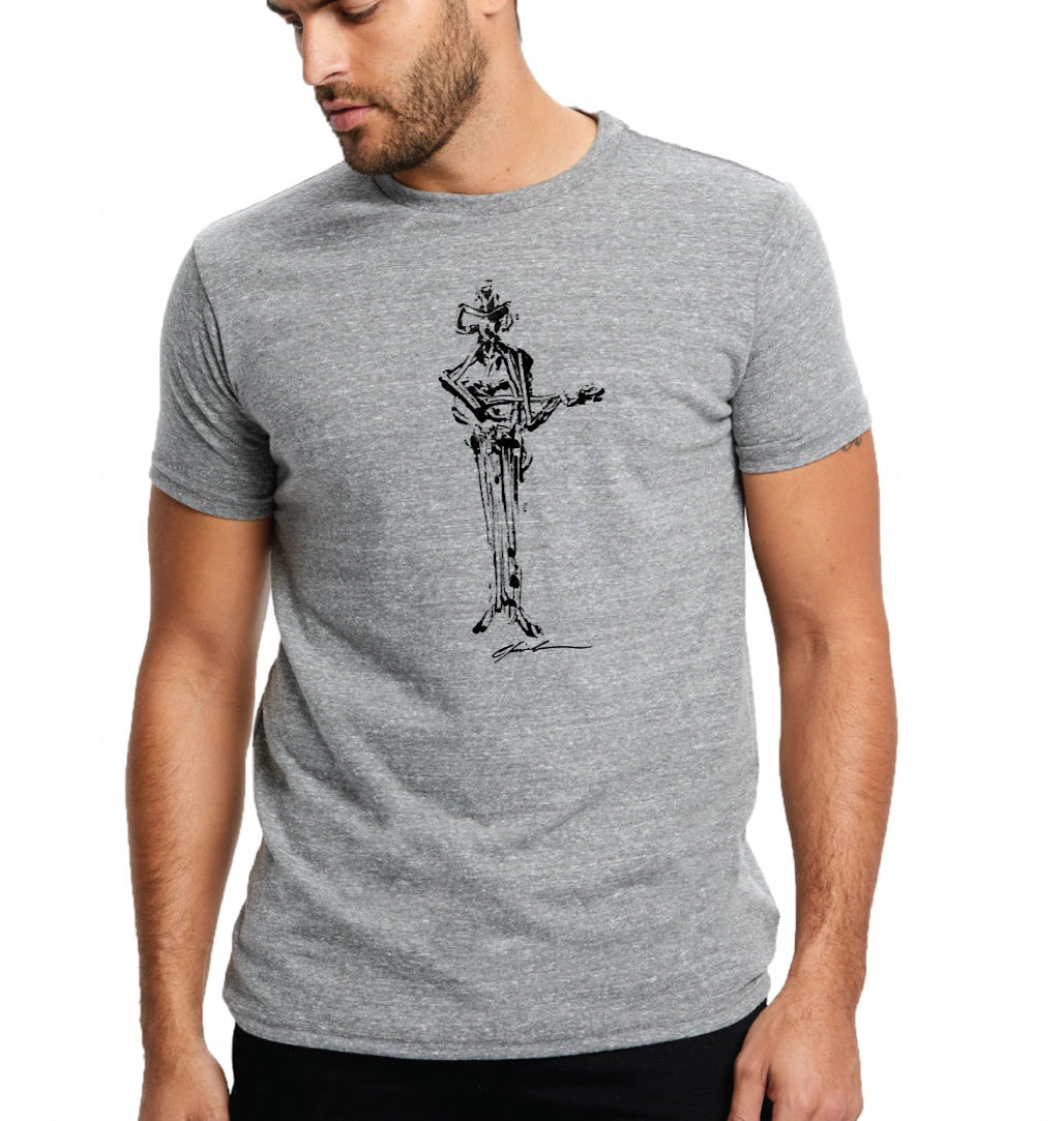 Model wearing a grey tri-blend T-shirt printed with a black ink cowboy playing guitar