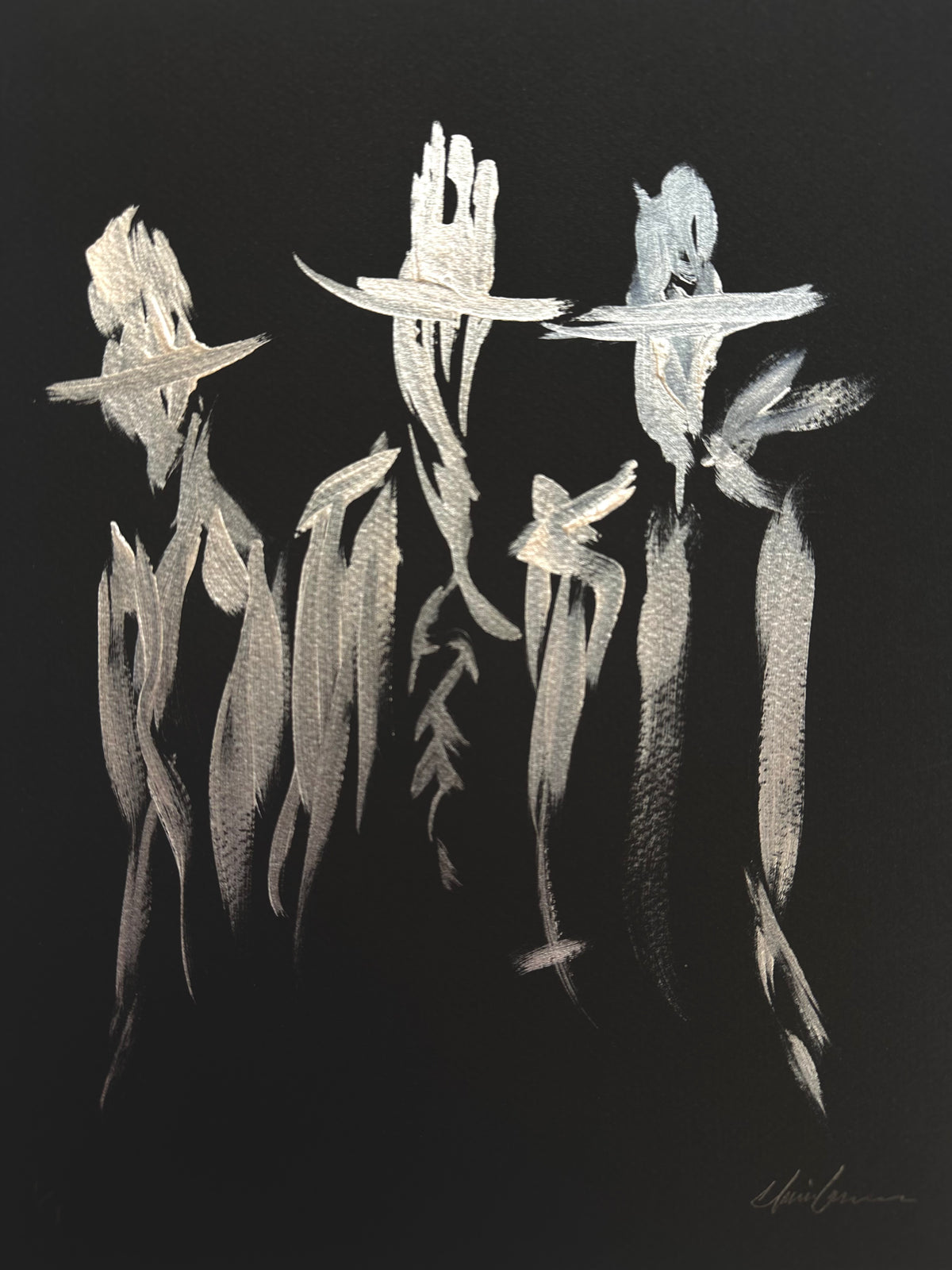 Reflective pearl acrylic painting of three cowboys in hats on black paper