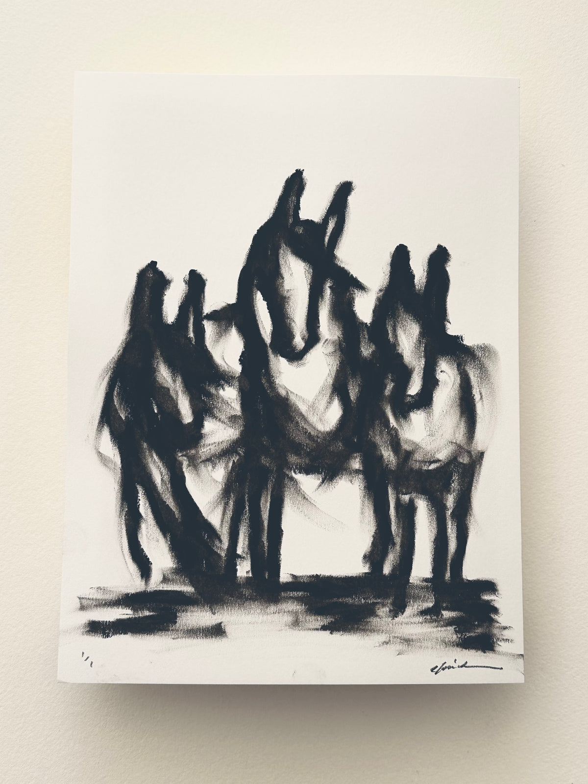 Black oil pastel drawing of a group of horses standing together on white Bristol board