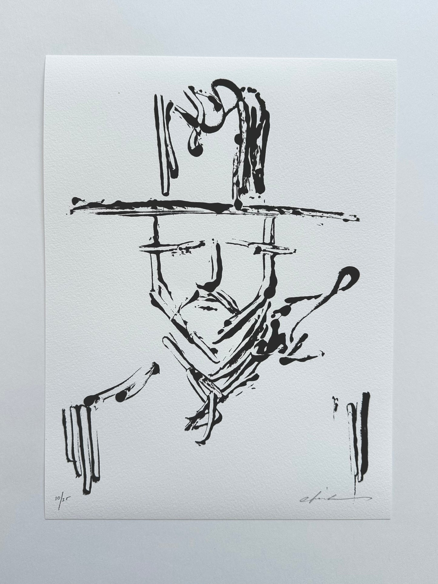 Black ink portrait of a man in a wide-brim hat with a guitar, giclée print on white paper
