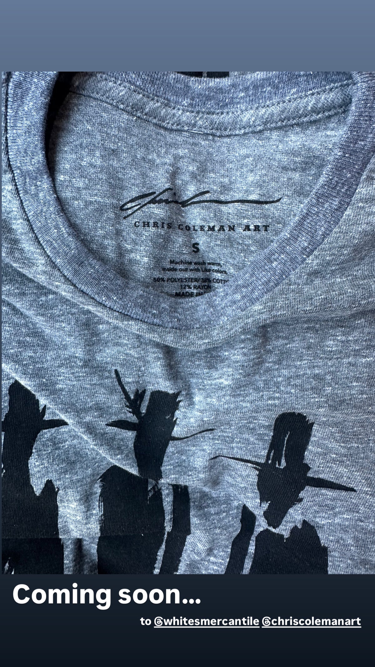 Close-up of the custom inner neck label on a grey T-shirt with a "Coming soon" caption